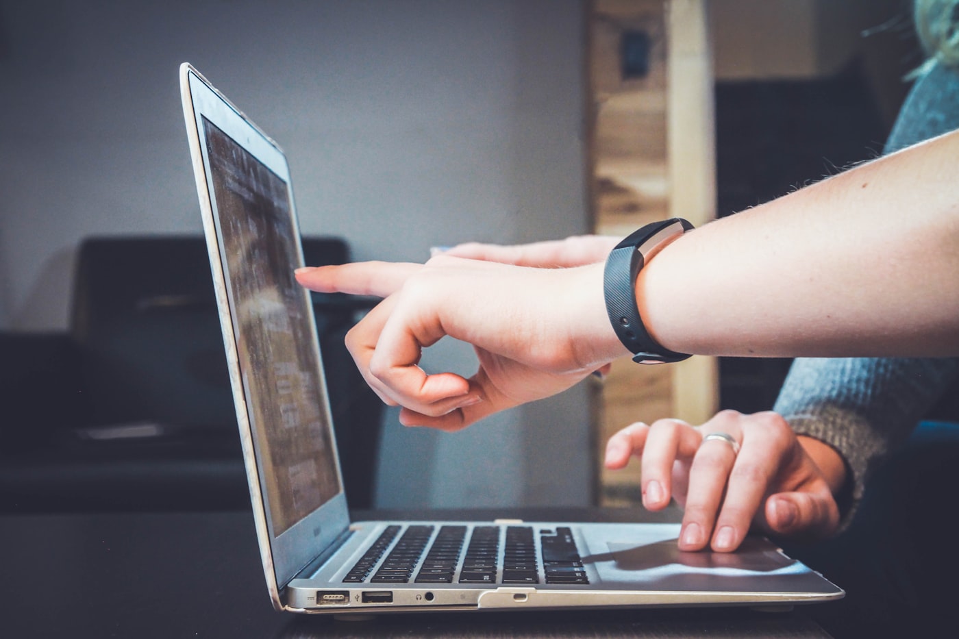 Person following on-screen steps to download a video file from the cloud